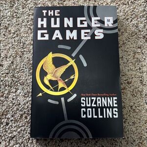 The Hunger Games by Suzanne Collins Paperback Book